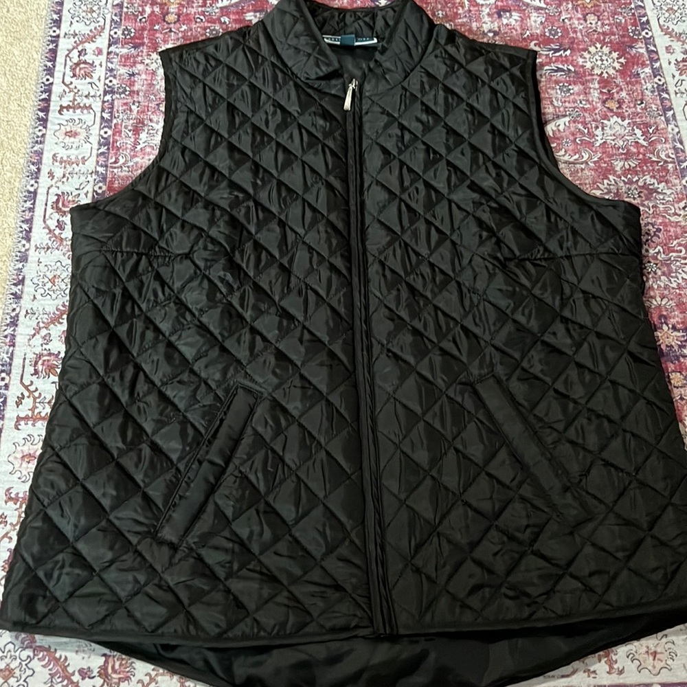 This is women’s large black quilted vest